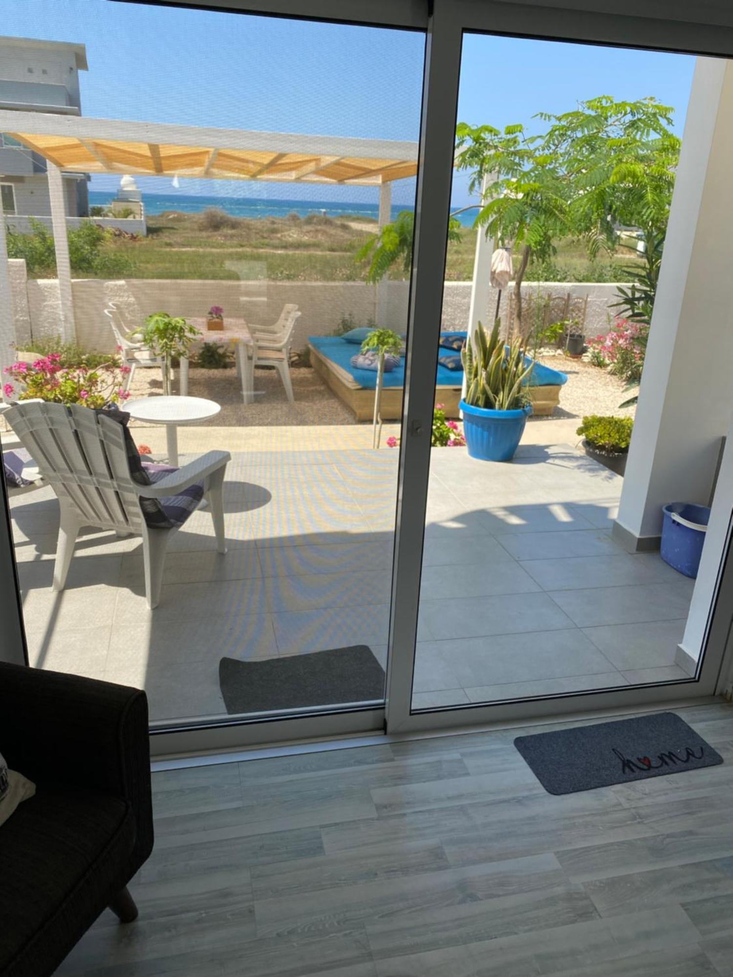 Cozy Beach House Перволия Екстериор снимка